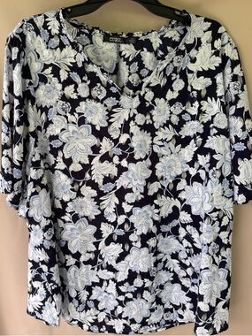 Women’s blue and white floral blouse